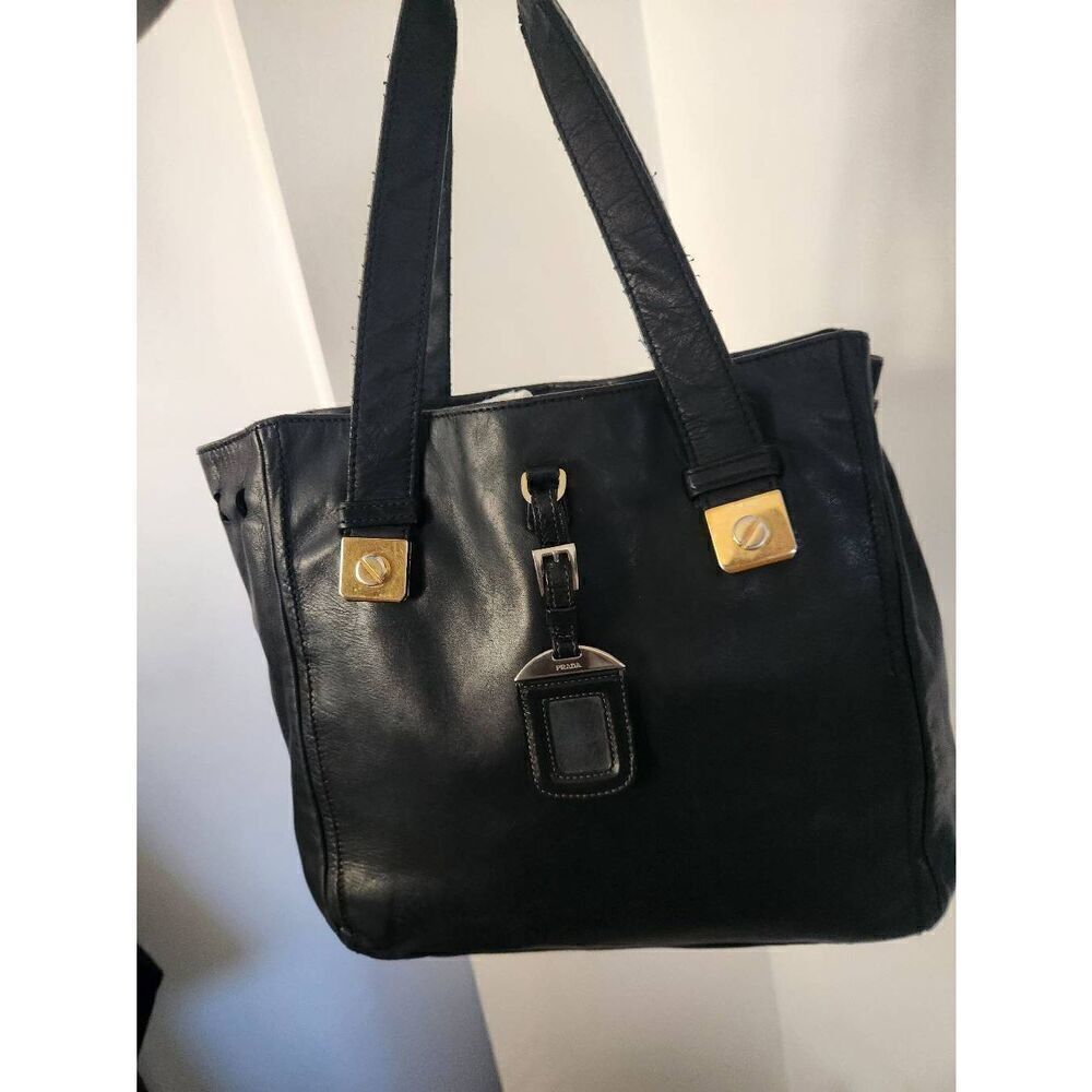 Prada Vintage black leather shoulder bag with gold and silver hardware and CERTI